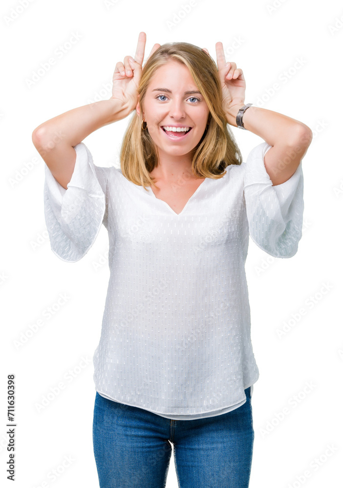 Beautiful young elegant woman over isolated background Posing funny and crazy with fingers on head as bunny ears, smiling cheerful Beautiful young elegant woman over isolated background Posing funny and crazy with fingers on head as bunny ears, smiling cheerful