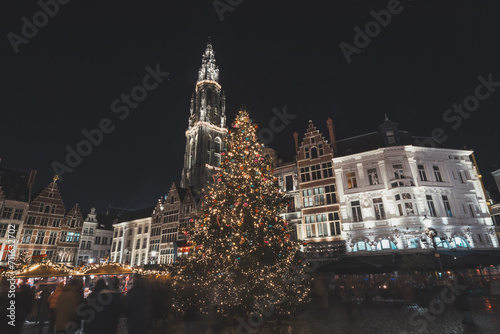Christmas lights illuminate the cathedral in the historic centre of Antwerp. The beauty of the Christmas market in December in Belgium