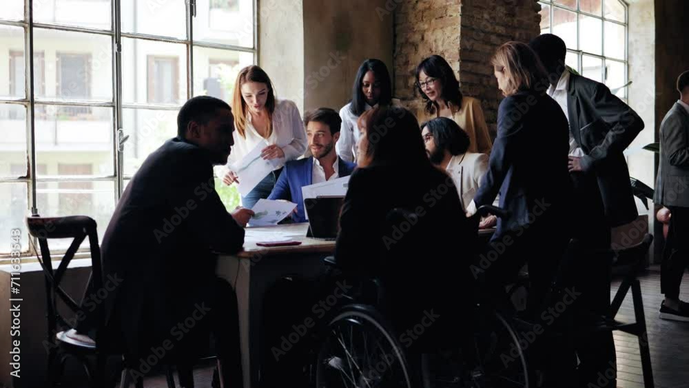 Multiracial business people working on financial project at bank office Multiracial business people working on financial project at bank office