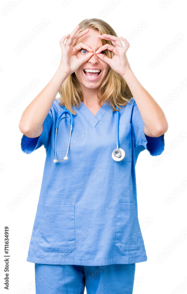 Beautiful young doctor woman wearing medical uniform over isolated background doing ok gesture like binoculars sticking tongue out, eyes looking through fingers. Crazy expression. Beautiful young doctor woman wearing medical uniform over isolated background doing ok gesture like binoculars sticking tongue out, eyes looking through fingers. Crazy expression.
