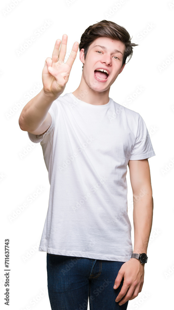 Young handsome man wearing casual white t-shirt over isolated background showing and pointing up with fingers number three while smiling confident and happy. Young handsome man wearing casual white t-shirt over isolated background showing and pointing up with fingers number three while smiling confident and happy.