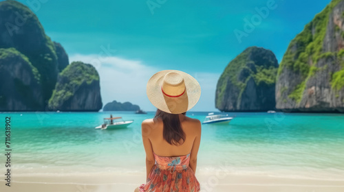 Traveler Asian woman in summer dress joy relaxing on sunny beach.