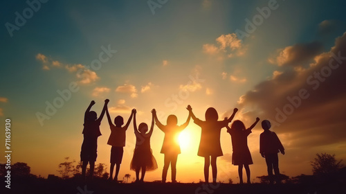 silhouette of family on sunset background © Santy Hong