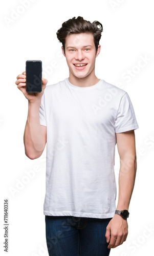 Young man showing smartphone screen over isolated background with a happy face standing and smiling with a confident smile showing teeth