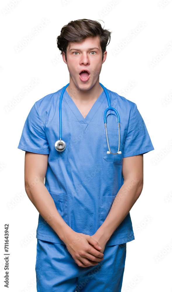 Young doctor wearing medical uniform over isolated background afraid and shocked with surprise expression, fear and excited face. Young doctor wearing medical uniform over isolated background afraid and shocked with surprise expression, fear and excited face.