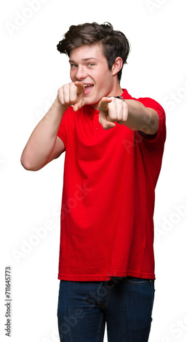 Young handsome man wearing red t-shirt over isolated background Pointing to you and the camera with fingers, smiling positive and cheerful