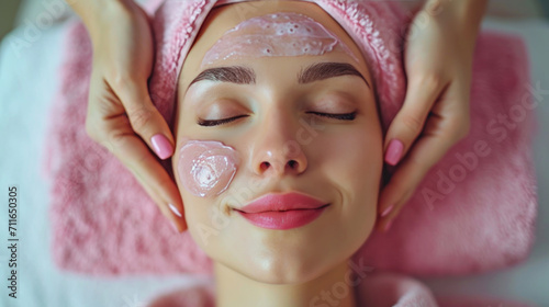 A woman makes a face mask in a beauty salon.