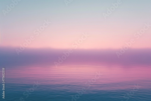 Calm pink and purple gradient over smooth water © alexandr