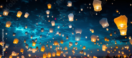 Flying lanterns in the night sky during the Diwali festival , yee Peng or midautumn day in china. Diwali Festival Sky Lanterns
China Midautumn Flying Lanterns photo