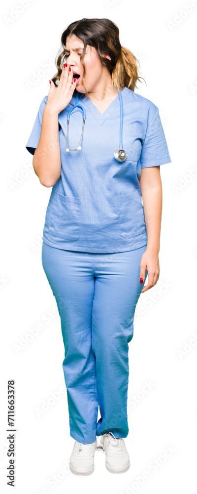 Young adult doctor woman wearing medical uniform bored yawning tired covering mouth with hand. Restless and sleepiness. Young adult doctor woman wearing medical uniform bored yawning tired covering mouth with hand. Restless and sleepiness.