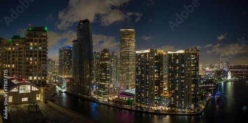 Aerial view of downtown district of of Miami Brickell in Florida  USA. Brightly illuminated high skyscraper buildings in modern american midtown