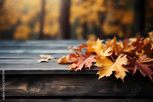 Autumn maple leaves on wooden table  falling leaves natural background