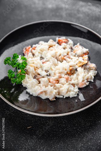 risotto seafood rice fresh delicious eating cooking appetizer meal food snack on the table copy space food background rustic top view