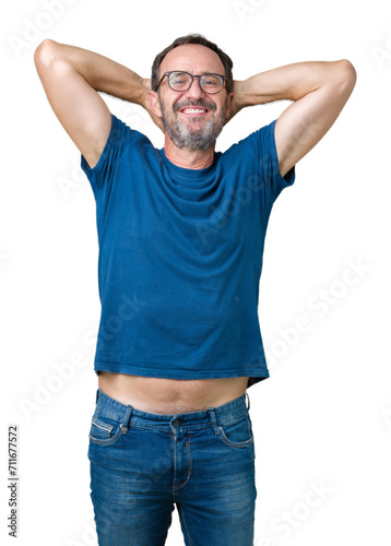 Handsome middle age hoary senior man wearin glasses over isolated background Relaxing and stretching with arms and hands behind head and neck, smiling happy