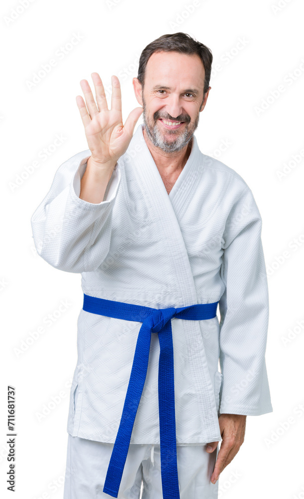 Handsome middle age senior man wearing kimono uniform over isolated background showing and pointing up with fingers number five while smiling confident and happy. Handsome middle age senior man wearing kimono uniform over isolated background showing and pointing up with fingers number five while smiling confident and happy.