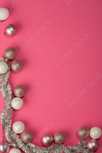 Vertical Christmas card on a pink background.