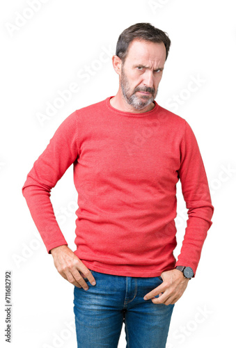 Handsome middle age hoary senior man wearing winter sweater over isolated background skeptic and nervous, frowning upset because of problem. Negative person.