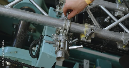 A movie camera mounted on a roller coaster cart.