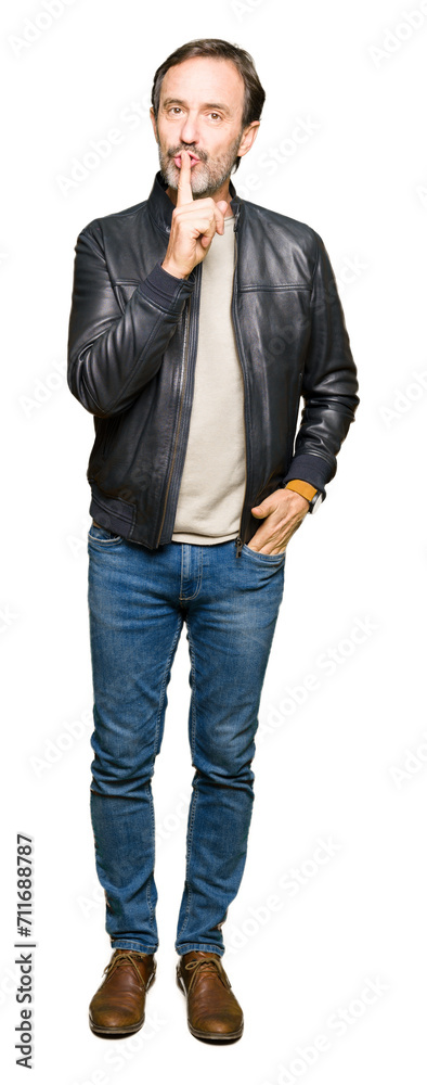 Middle age handsome man wearing black leather jacket asking to be quiet with finger on lips. Silence and secret concept. Middle age handsome man wearing black leather jacket asking to be quiet with finger on lips. Silence and secret concept.