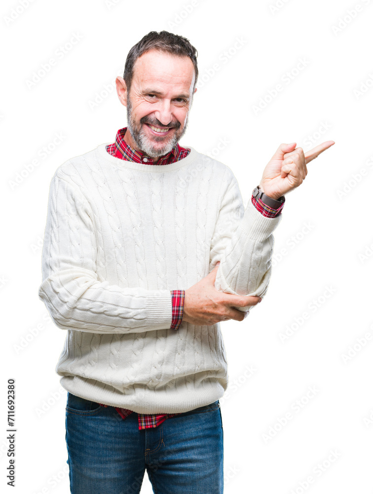 Middle age hoary senior man wearing winter sweater over isolated background with a big smile on face, pointing with hand and finger to the side looking at the camera. Middle age hoary senior man wearing winter sweater over isolated background with a big smile on face, pointing with hand and finger to the side looking at the camera.