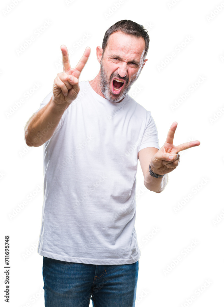 Middle age hoary senior man wearing white t-shirt over isolated background smiling looking to the camera showing fingers doing victory sign. Number two. Middle age hoary senior man wearing white t-shirt over isolated background smiling looking to the camera showing fingers doing victory sign. Number two.