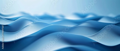Soft blue waves undulate in an abstract pattern, creating a serene and rhythmic texture background.
