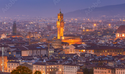 Fotografia Palazzo Vecchio and Arnolfo Tower in Florence at sunset.
