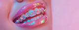 Glittering Rainbow Braces on Pearly Teeth, background with copy space. Close-up of sparkling multicolored orthodontic braces on white teeth, glossy pink lips.