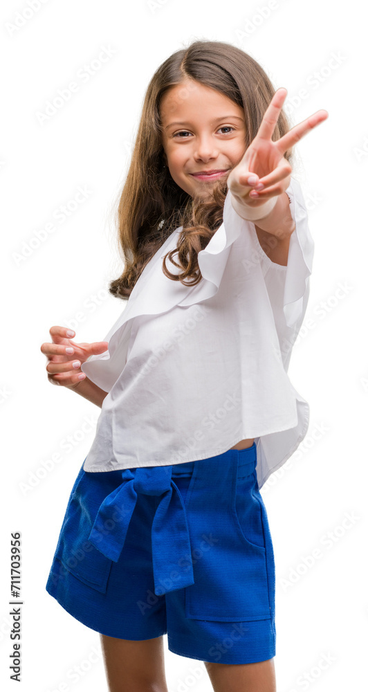 Brunette hispanic girl smiling looking to the camera showing fingers doing victory sign. Number two. Brunette hispanic girl smiling looking to the camera showing fingers doing victory sign. Number two.
