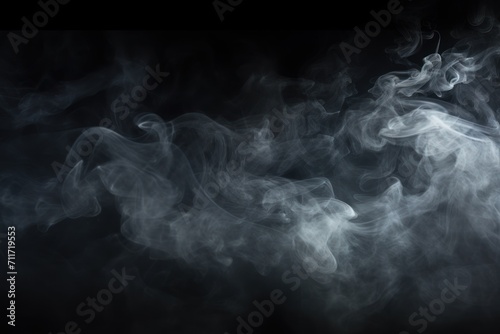 Empty dark background with charcoal smoke