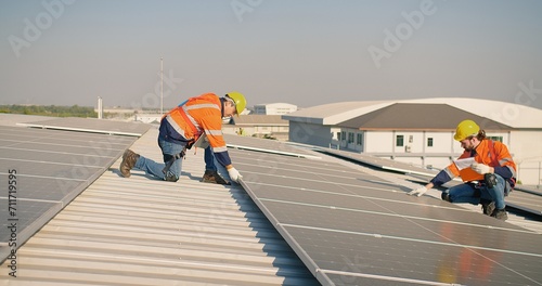 Wallpaper Mural engineer man contractor worker architect construction manager in uniform and hardhat work to maintenance checking an operation and efficiency performance of photovoltaic solar panels on roof Torontodigital.ca