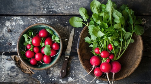 A bunch of radishes with leaves lying in a bowl next to a knife on a wooden stand