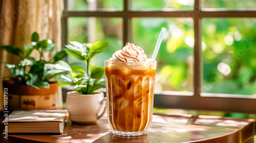Quench your thirst with the delightful indulgence of an iced caramel latte. Topped with velvety whipped cream and drizzled with caramel sauce, a sweet and refreshing coffee treat awaits.
