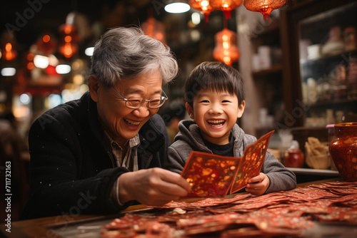 Asian Grandma and her grandson, looking at the menu in a Chinese restaurant