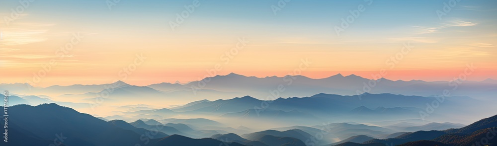 view of the mountains at sunset from the peak