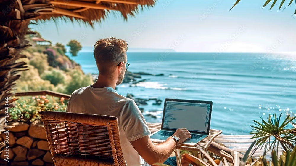 Blogger male tourist working remotely on a netbook computer while enjoying the sea view made with Ai generative technology, person is fictional