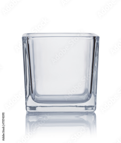 Front view of empty glass candle holder photo