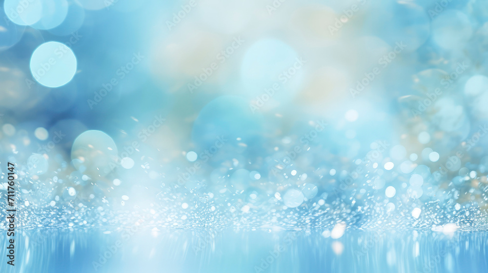 Light blue background with bokeh and defocused sparkles falling down. Festive abstract banner with smokey blue backdrop and illuminated bokeh particles.