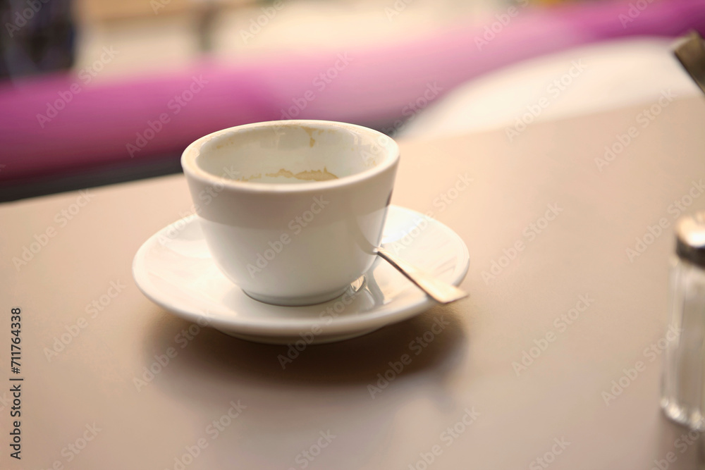 Still of an empty coffee cup in a coffee shop Still of an empty coffee cup in a coffee shop