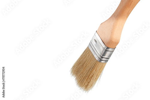 brush for painting walls close-up, on a black background, clean paint brush, isolated, empty space for your text. photo