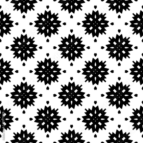 Abstract black figures on a whire background. Seamless texture for fashion, textile design,  on wall paper, wrapping paper, fabrics and home decor. Simple repeat pattern.