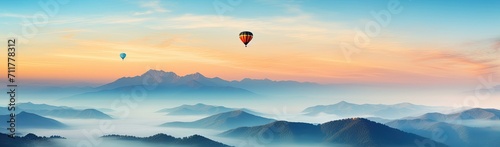 view of the mountains at sunset from the peak