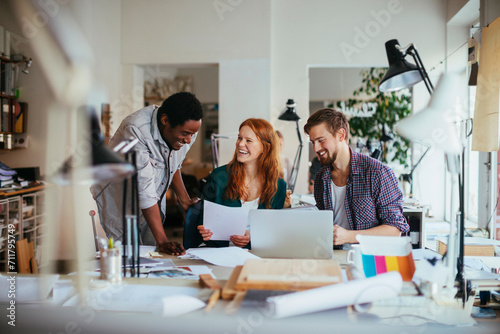 Multiracial team working together in a creative office