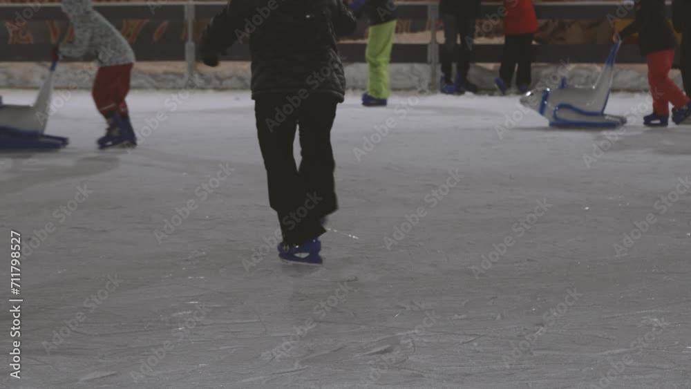 people are skating. ice skates people are skating. ice skates