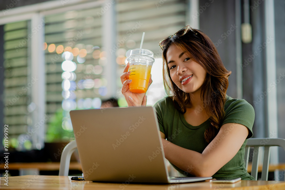 Drink sweetened orange juice for health. Women are beautiful and love their health and beauty. High vitamin C drinks Drink sweetened orange juice for health. Women are beautiful and love their health and beauty. High vitamin C drinks