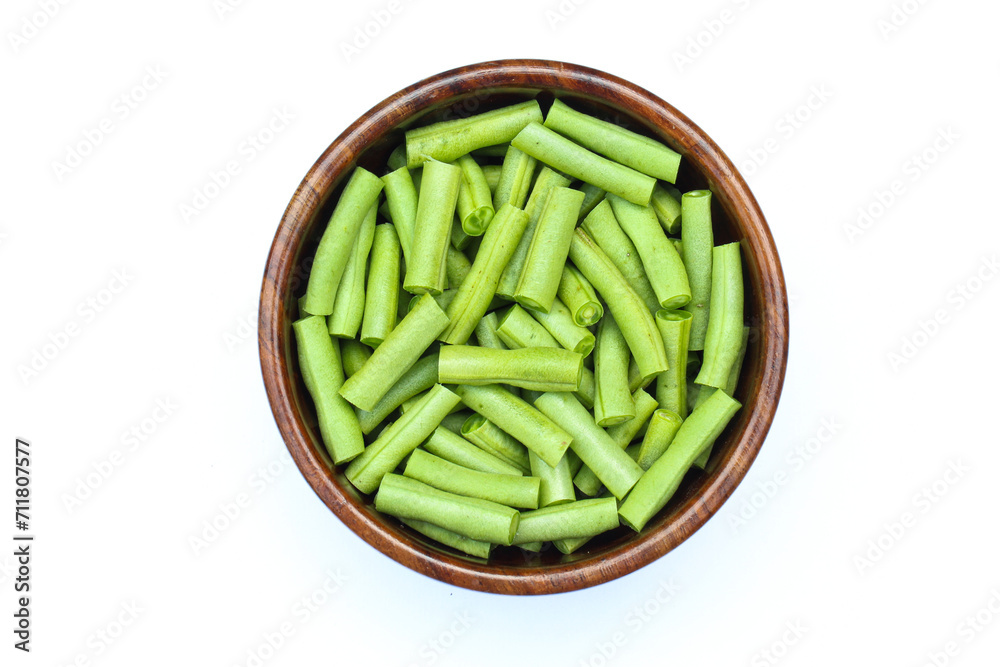 Asparagus beans or Yardlong beans sliced in a wooden bowl top view Asparagus beans or Yardlong beans sliced in a wooden bowl top view