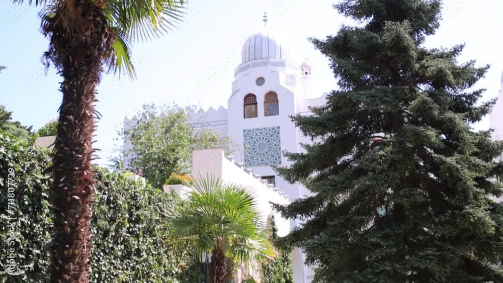 Old Palace Dulber with palm trees in courtyard in Yalta Old Palace Dulber with palm trees in courtyard in Yalta