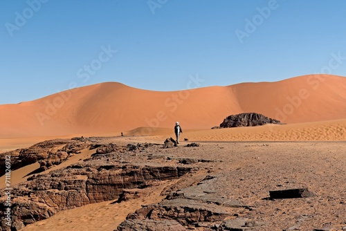 View of Dunes of Ouan Zaoutan, sand dunes in Tadrart Rouge, Tassili n Ajjer National Park. Sahara, Algeria, Africa.