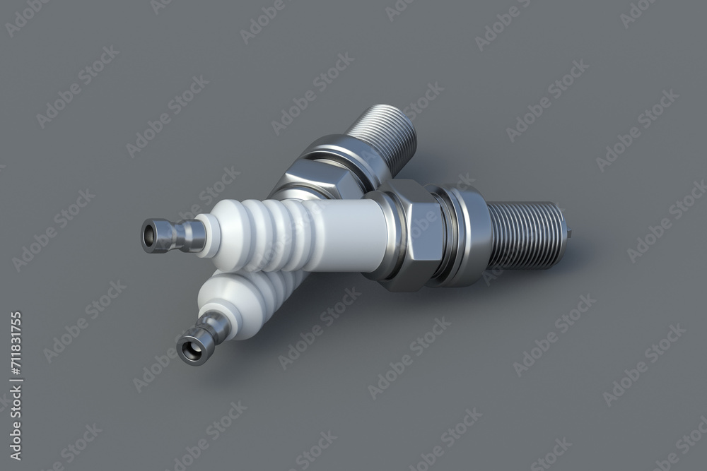 Two car sparks plug on gray background. Automotive parts. Service station. Engine repair. Auto equipment. Motorcycle maintenance. 3d render Two car sparks plug on gray background. Automotive parts. Service station. Engine repair. Auto equipment. Motorcycle maintenance. 3d render
