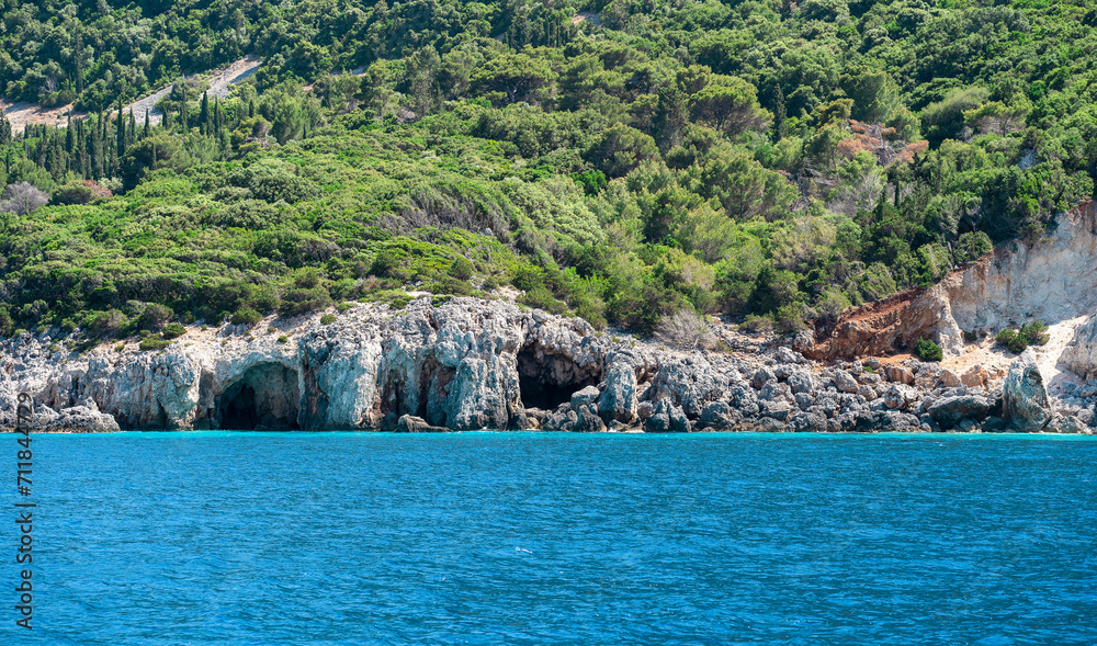 Beautiful summer Mediterranean coast with caves in rocks